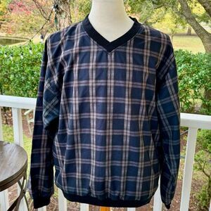 Forresters pullover Windbreaker. Navy plaid. Size Large.
